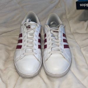 White and burgundy low top adidas. Size 9 in women’s.
